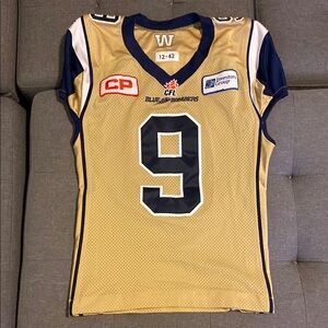 Game-Worn Winnipeg Blue Bombers Gold Navy Reebok CFL Jersey 2015 #9 Thad Gibson